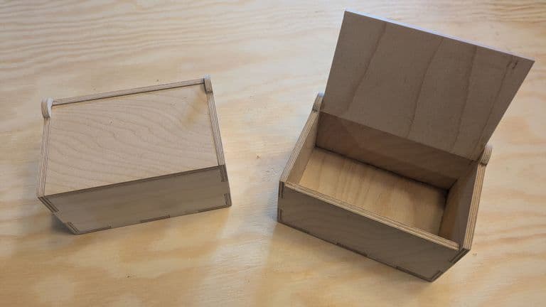 Wooden box with hinged lid