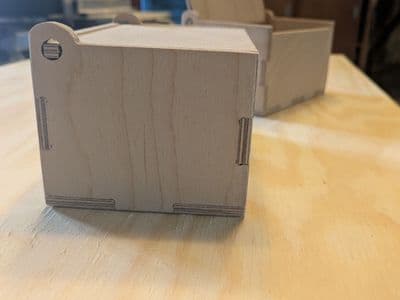 Wooden box with hinged lid