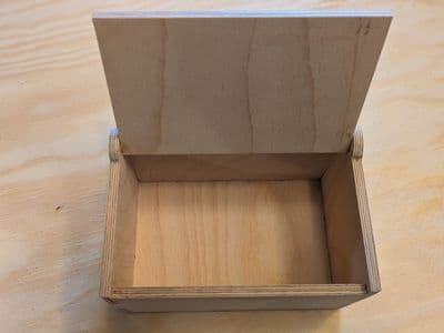Wooden box with hinged lid